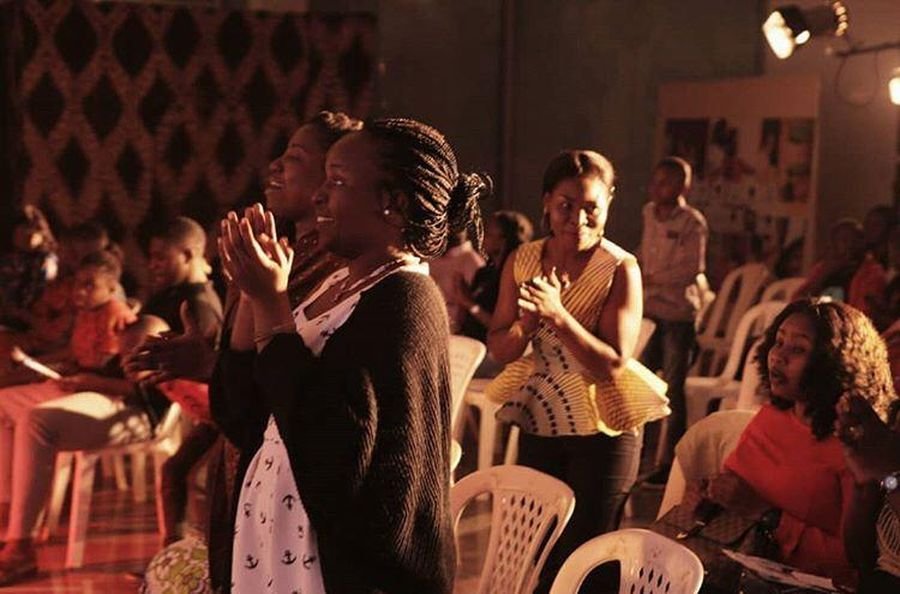 Audience on their feet applauding